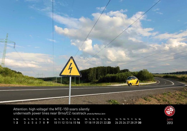 June 2013 MonoTracer of Switzerland Calendar - Attention: high voltage!  the MTE-150 soars silently underneath power lines near Brno/CZ racetrack.